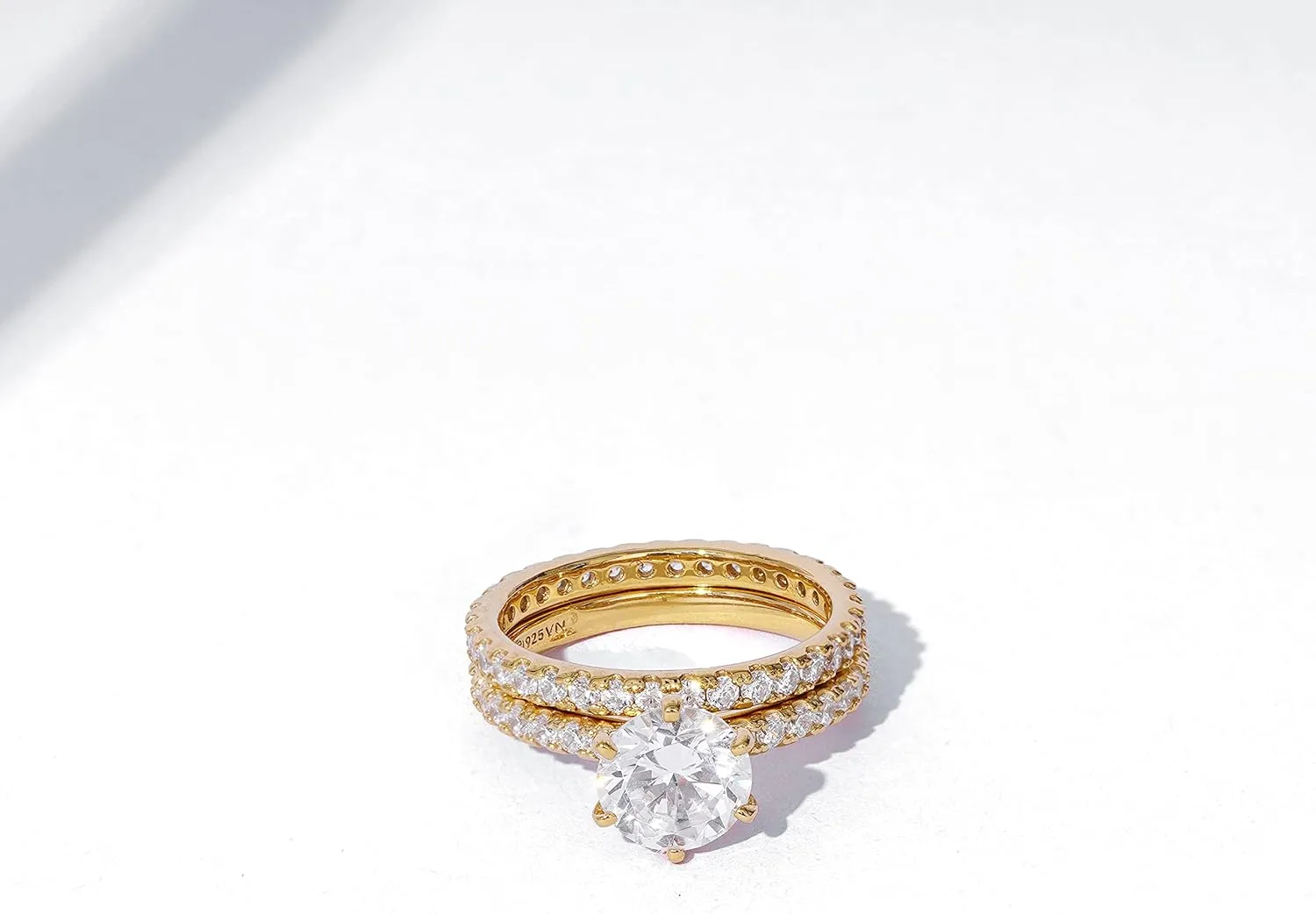 Amazon Essentials Platinum or Gold Plated Sterling Silver Wedding Set Rings set with Round Cut Infinite Elements Cubic Zirconia (previously Amazon Collection)