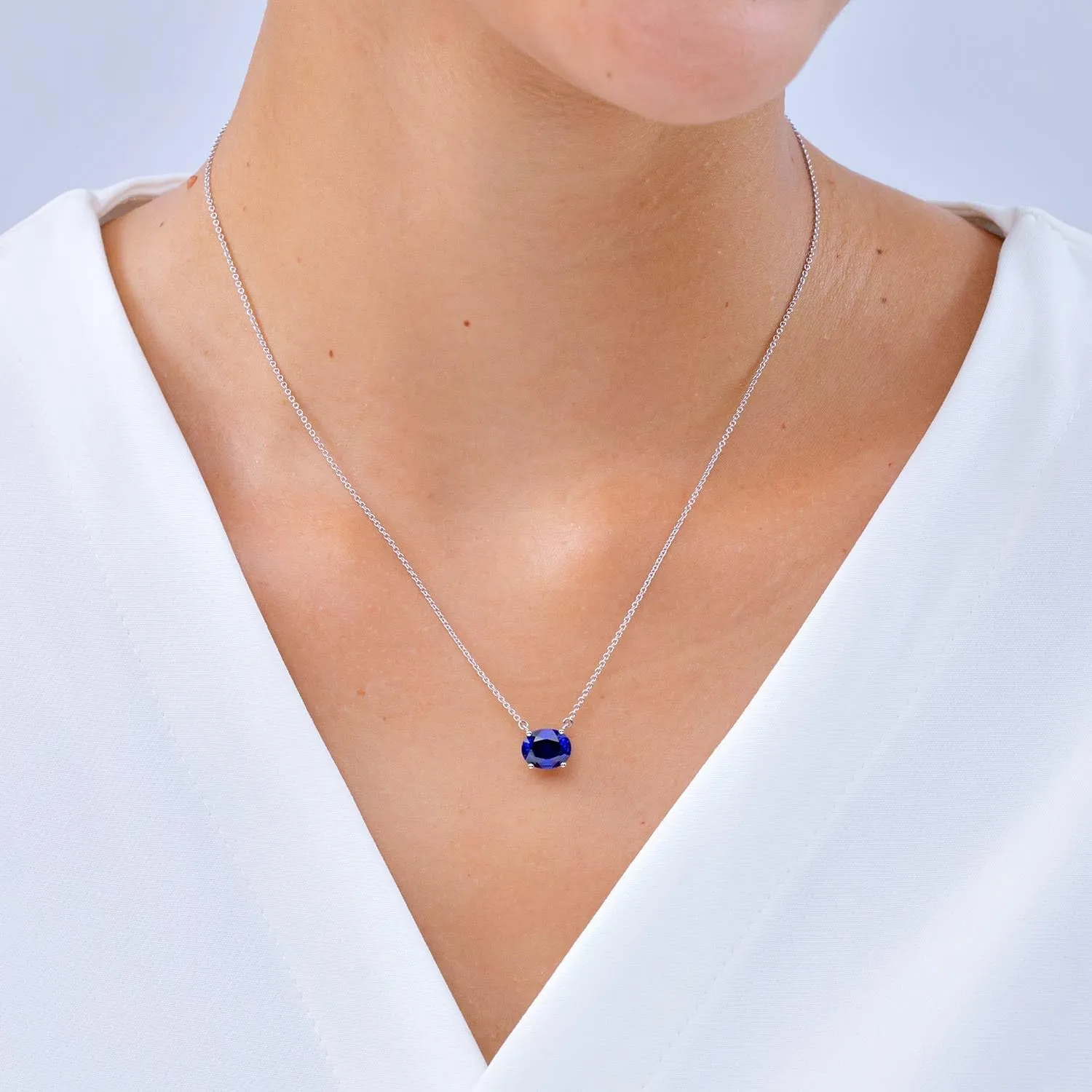 Angara Lab Grown East-West Oval Blue Sapphire Solitaire Pendant in Silver / 14K Solid Gold/Platinum | September Birthstone, Birthday, Engagement, Anniversary, Wedding Jewelry Gift for Women