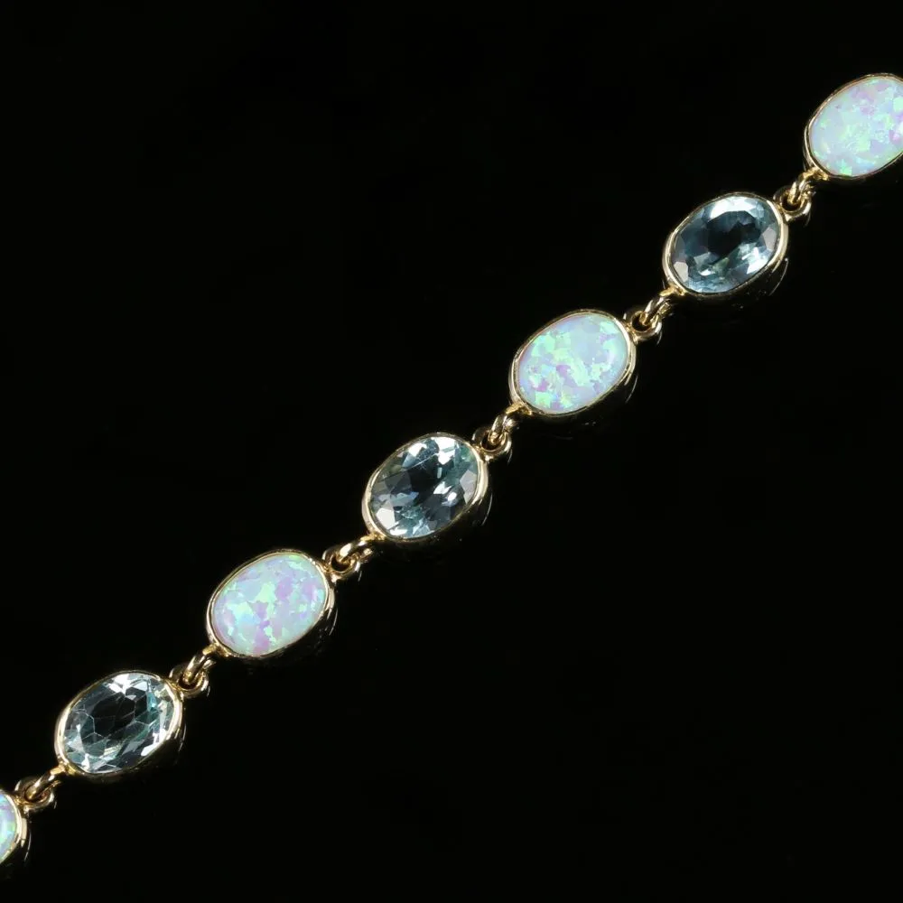 Blue Topaz And Opal Bracelet 9Ct Gold