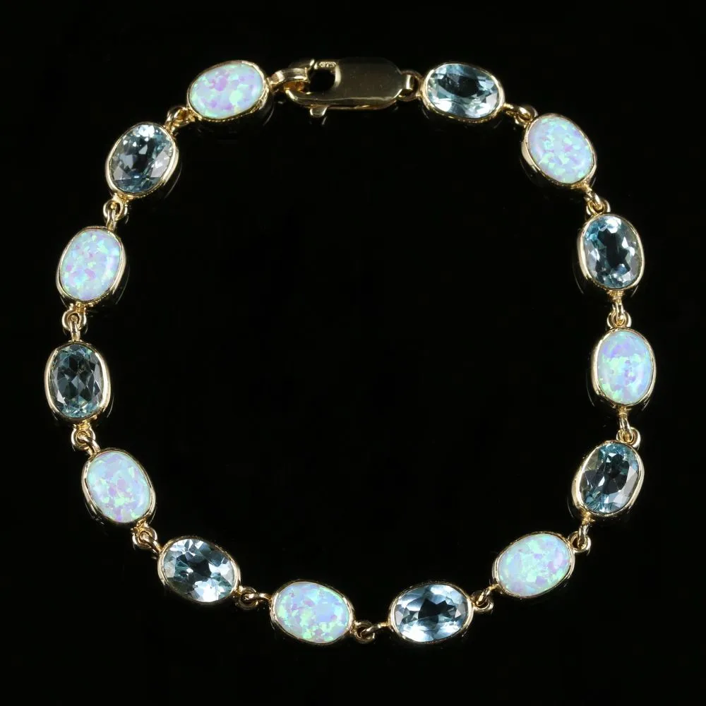 Blue Topaz And Opal Bracelet 9Ct Gold