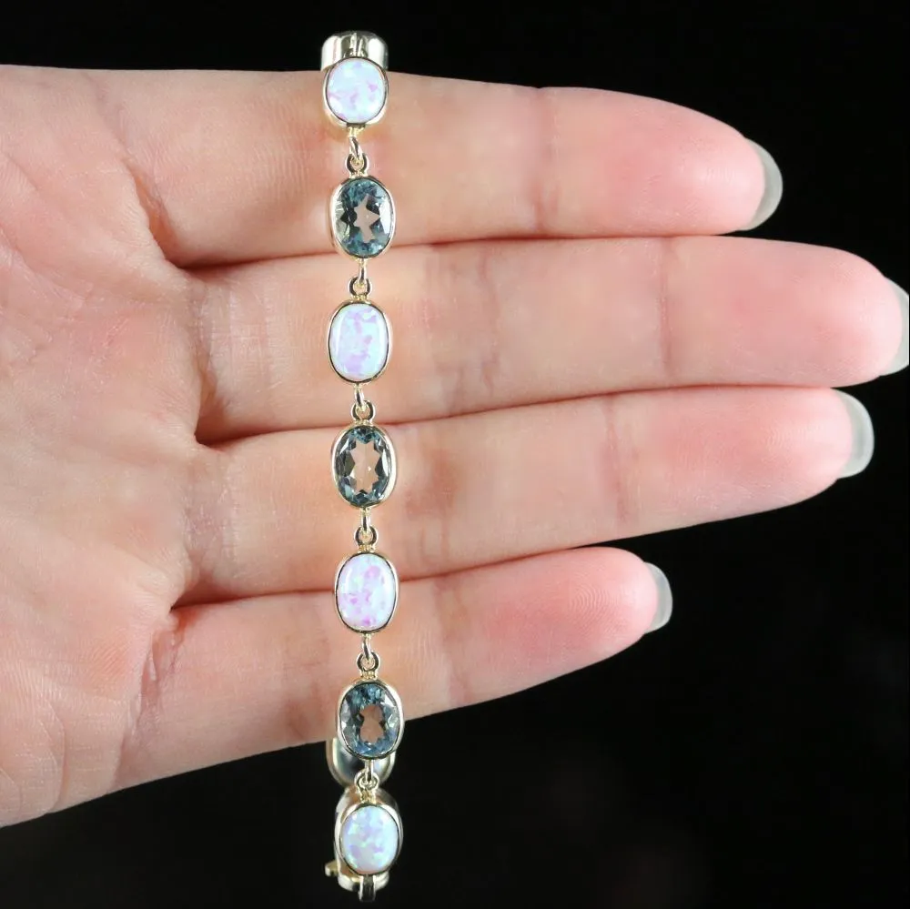 Blue Topaz And Opal Bracelet 9Ct Gold