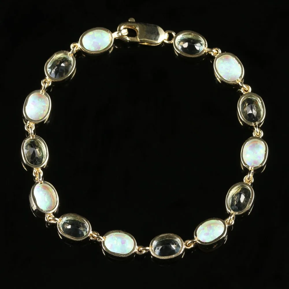 Blue Topaz And Opal Bracelet 9Ct Gold