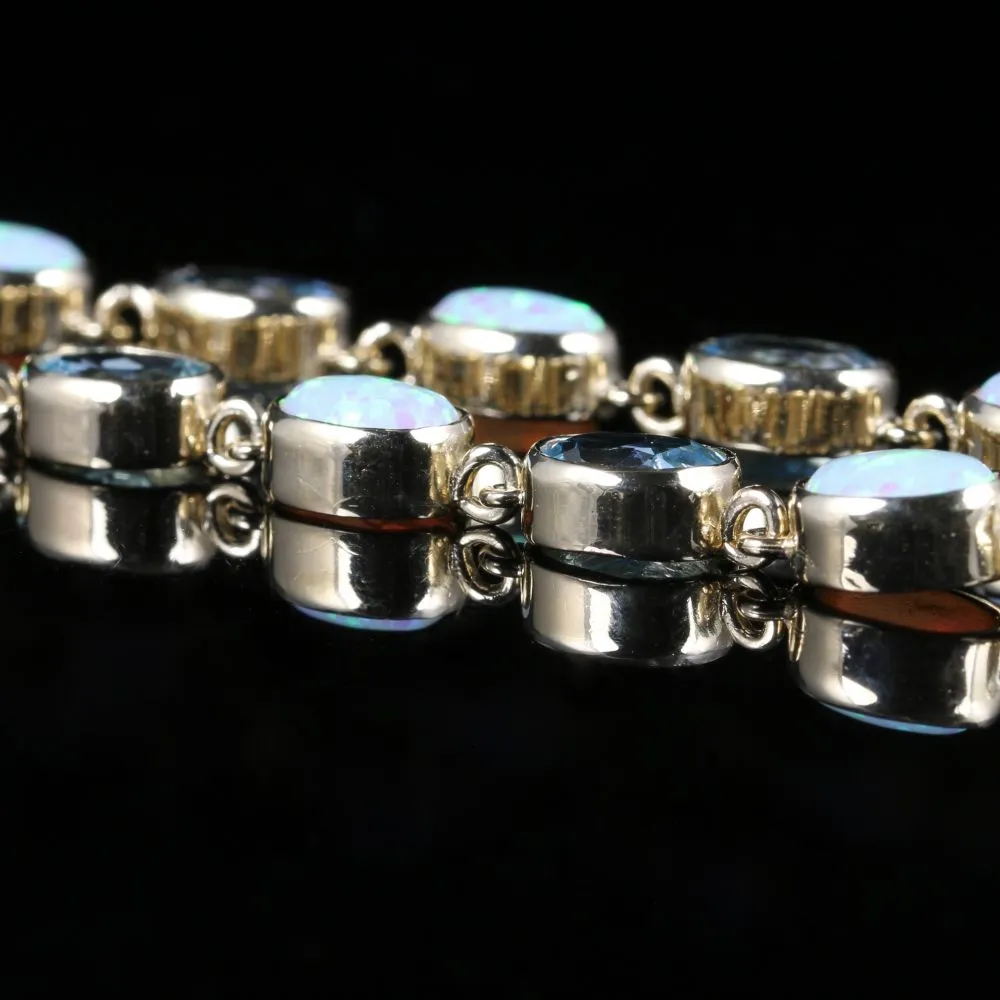 Blue Topaz And Opal Bracelet 9Ct Gold