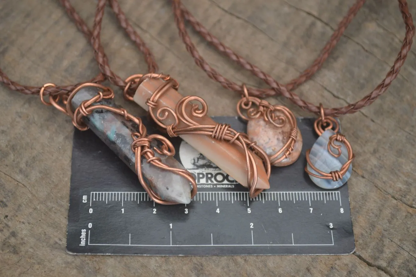 Polished Copper Wire Wrapped Ancient Eagle Pendants  x 12 From Zimbabwe